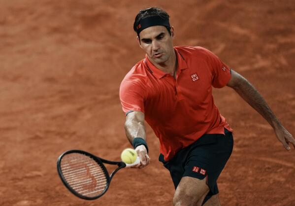 The Latest Federer comes through tough test at French Open AP News